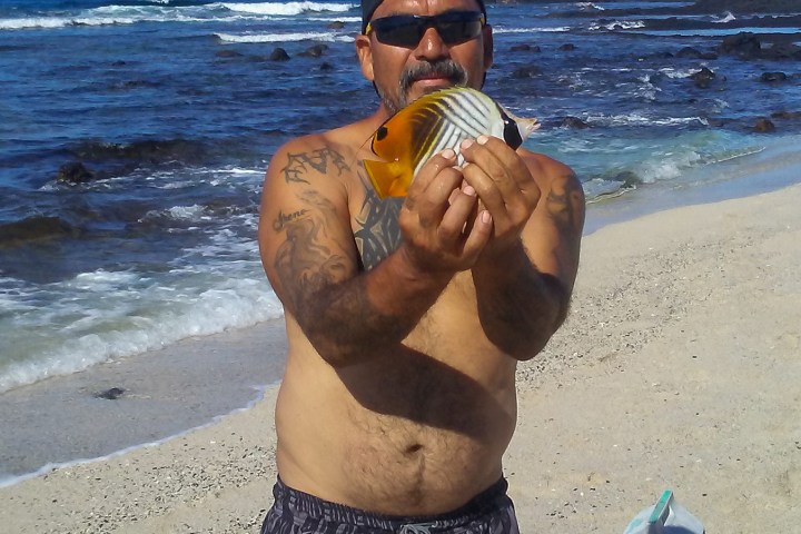man holding a fish